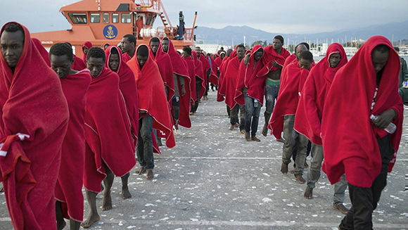 Africa emigracion patera Llegada al puerto de Motril Granada de los 29 ocupantes de una embarcación neumática que llevaba más de 30 horas en el agua. EFE