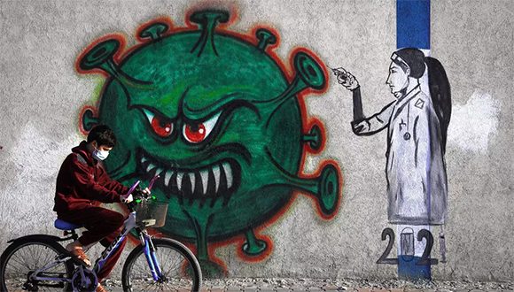 Covid nino palestina cartel 580x330
